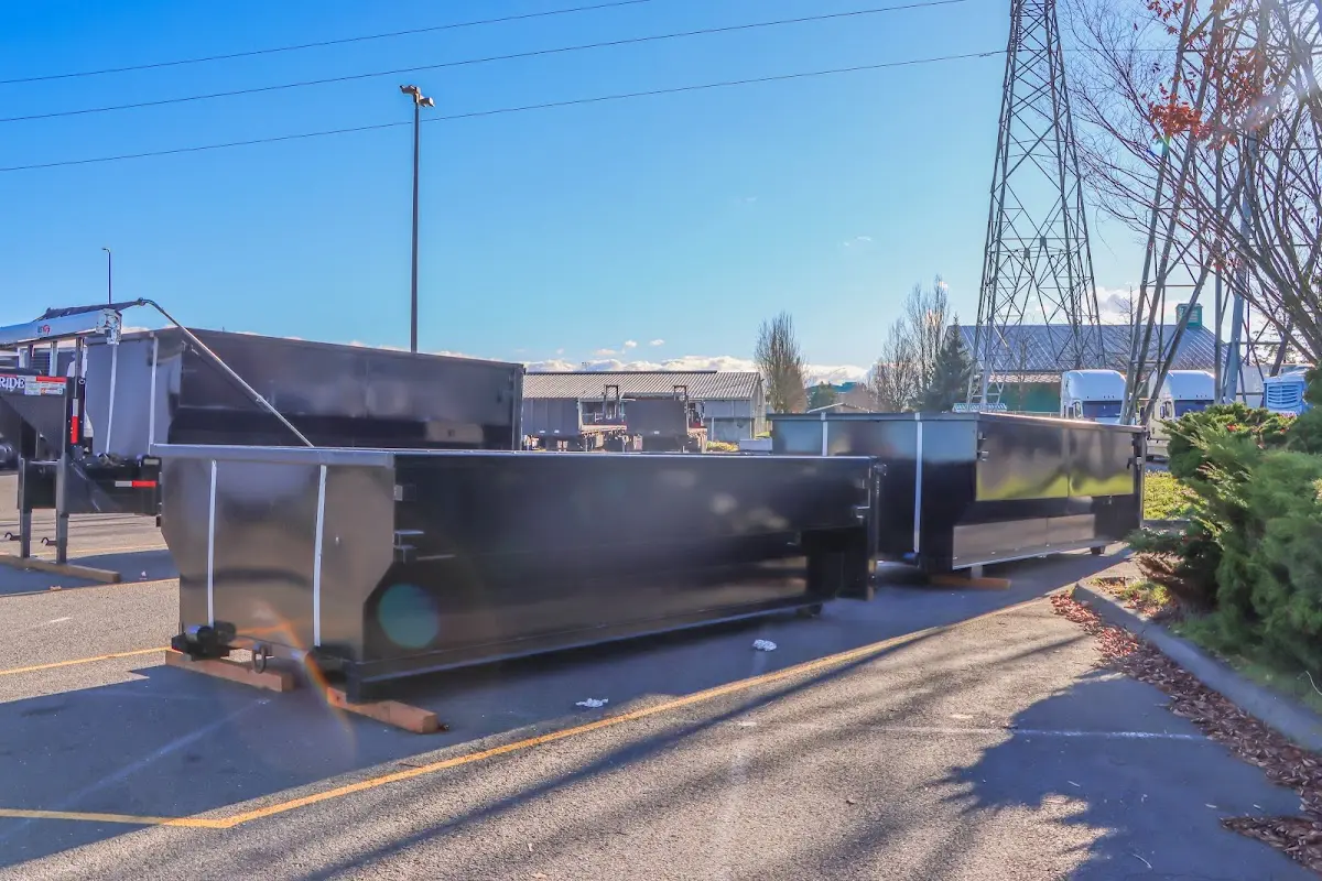 Roll-off dumpster ready for waste disposal at job site for 2 Yard Dumpster Rental in Morgan City